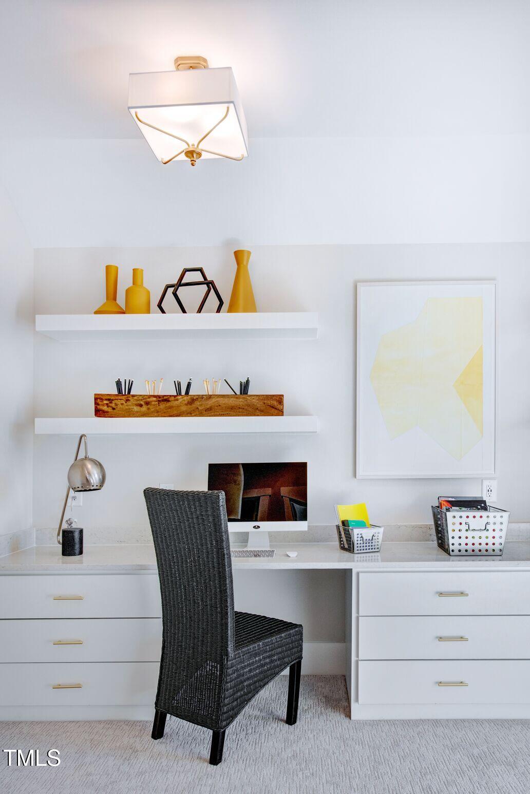 8904 Nicewonder Way Wake Forest, NC 27587 - Photo 44 of 50 a hallway with a table and couch