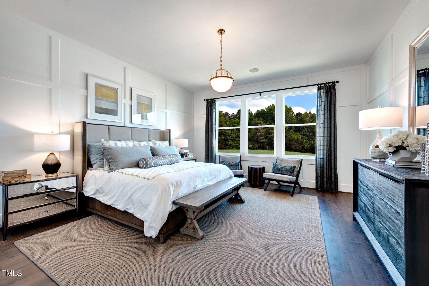 8904 Nicewonder Way Wake Forest, NC 27587 - Photo 47 of 50 a bedroom with a bed and a window