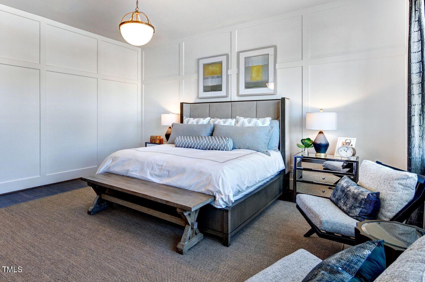 8904 Nicewonder Way Wake Forest, NC 27587 - Photo 50 of 50 a bedroom with a bed and wooden floor