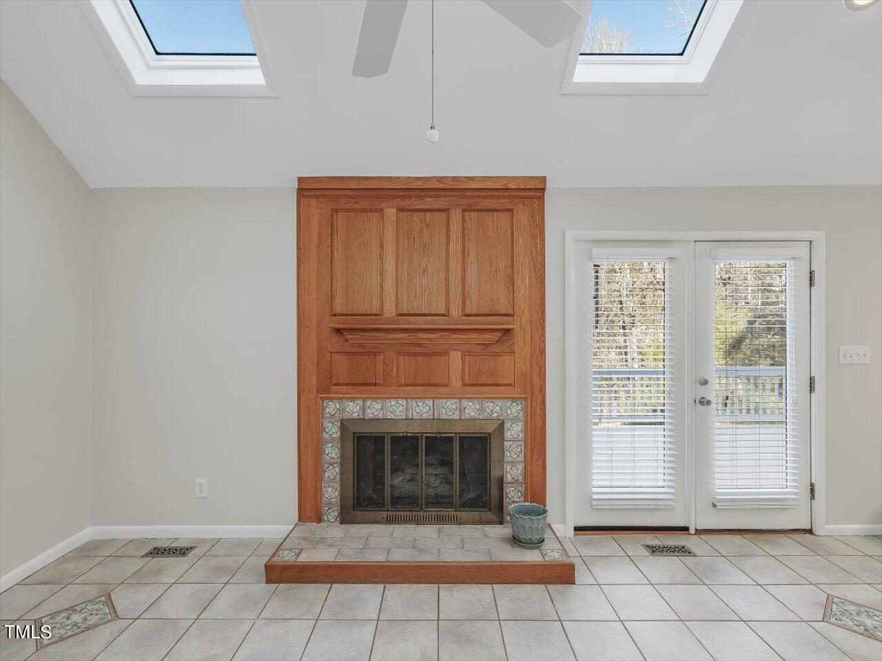 2616 Catalina Drive Raleigh, NC 27607 - Photo 13 of 60 a view of a livingroom with a fireplace