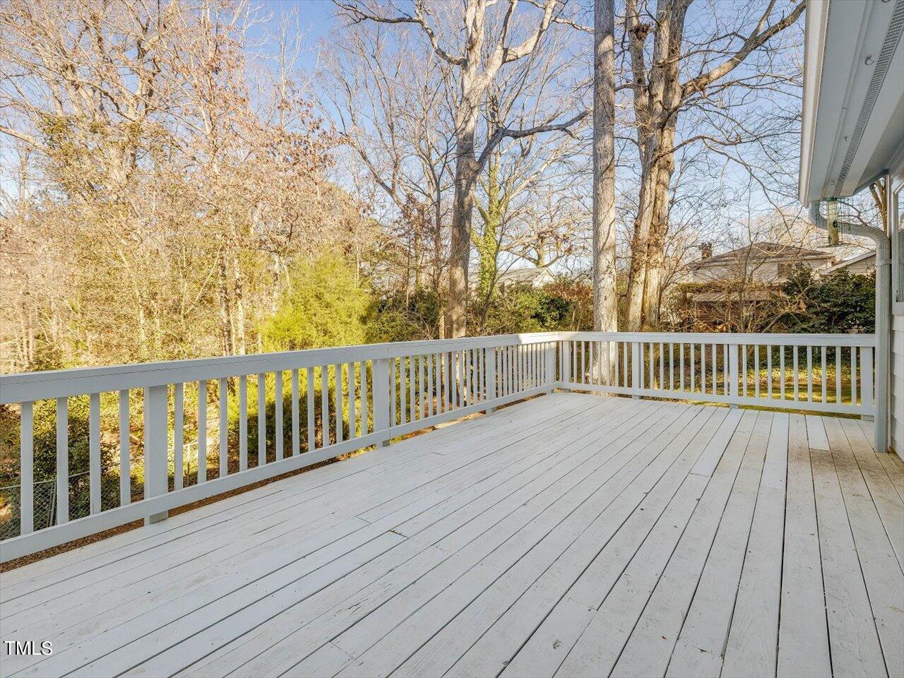 2616 Catalina Drive Raleigh, NC 27607 - Photo 17 of 60 a view of deck with wooden floor and fence