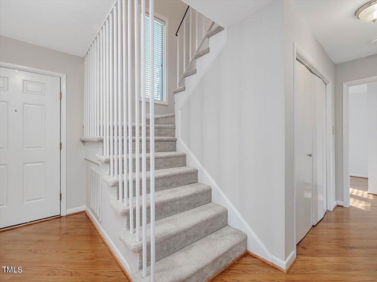 2616 Catalina Drive Raleigh, NC 27607 - Photo 34 of 60 a view of entryway and hall with wooden floor