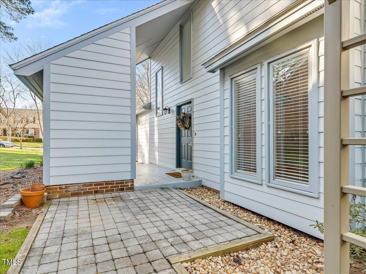 2616 Catalina Drive Raleigh, NC 27607 - Photo 47 of 60 a view of a house with a door and wooden floor