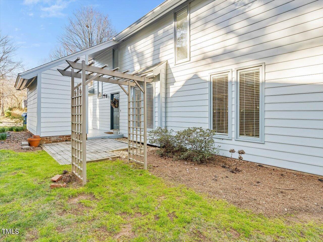 2616 Catalina Drive Raleigh, NC 27607 - Photo 48 of 60 a view of a house with backyard and porch