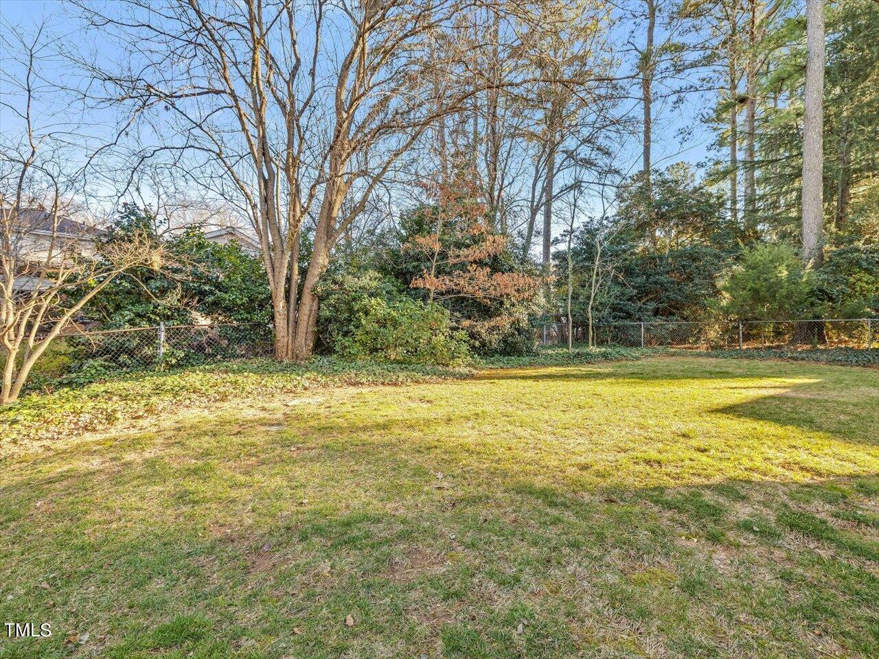 2616 Catalina Drive Raleigh, NC 27607 - Photo 51 of 60 a view of a swimming pool with an outdoor space
