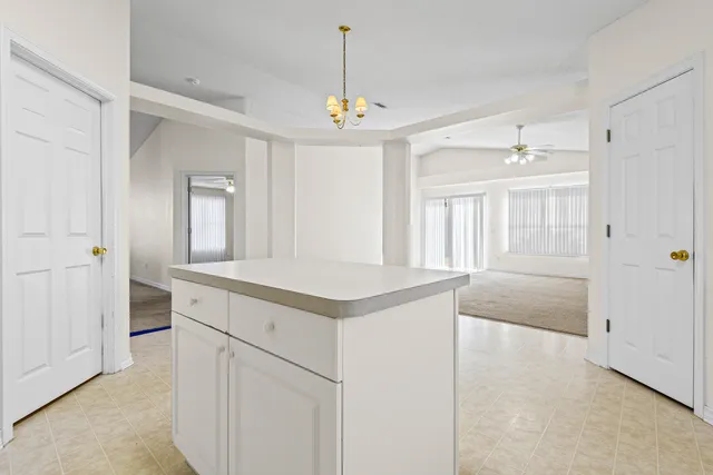 a view of an entryway with kitchen