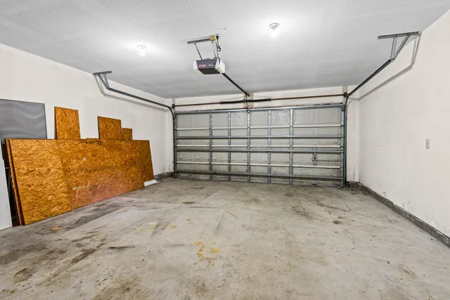 a view of potted plants in front of house