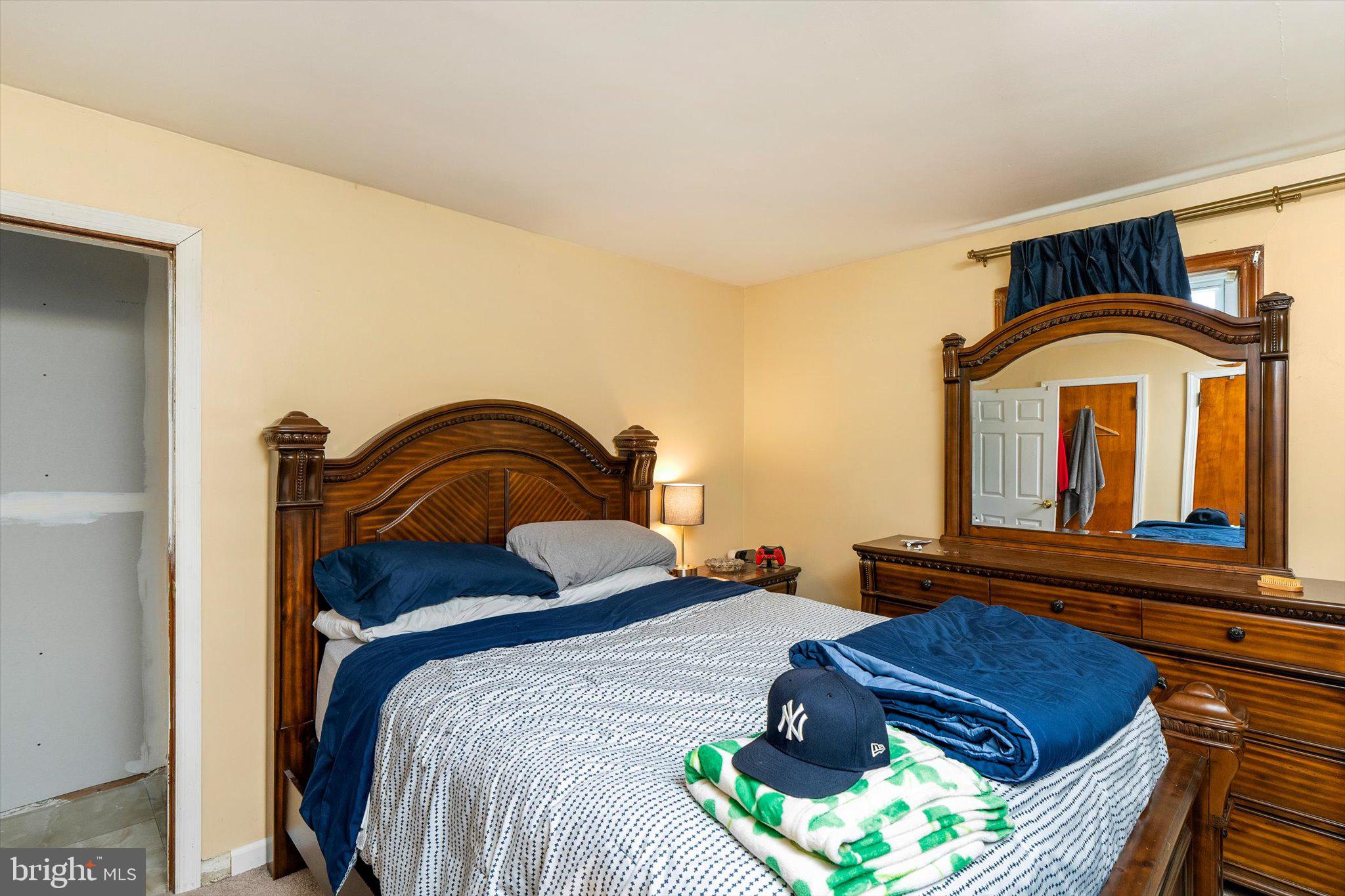 319 Station Road Roebling, NJ 08554 - Photo 10 of 15 a bedroom with bed and a window