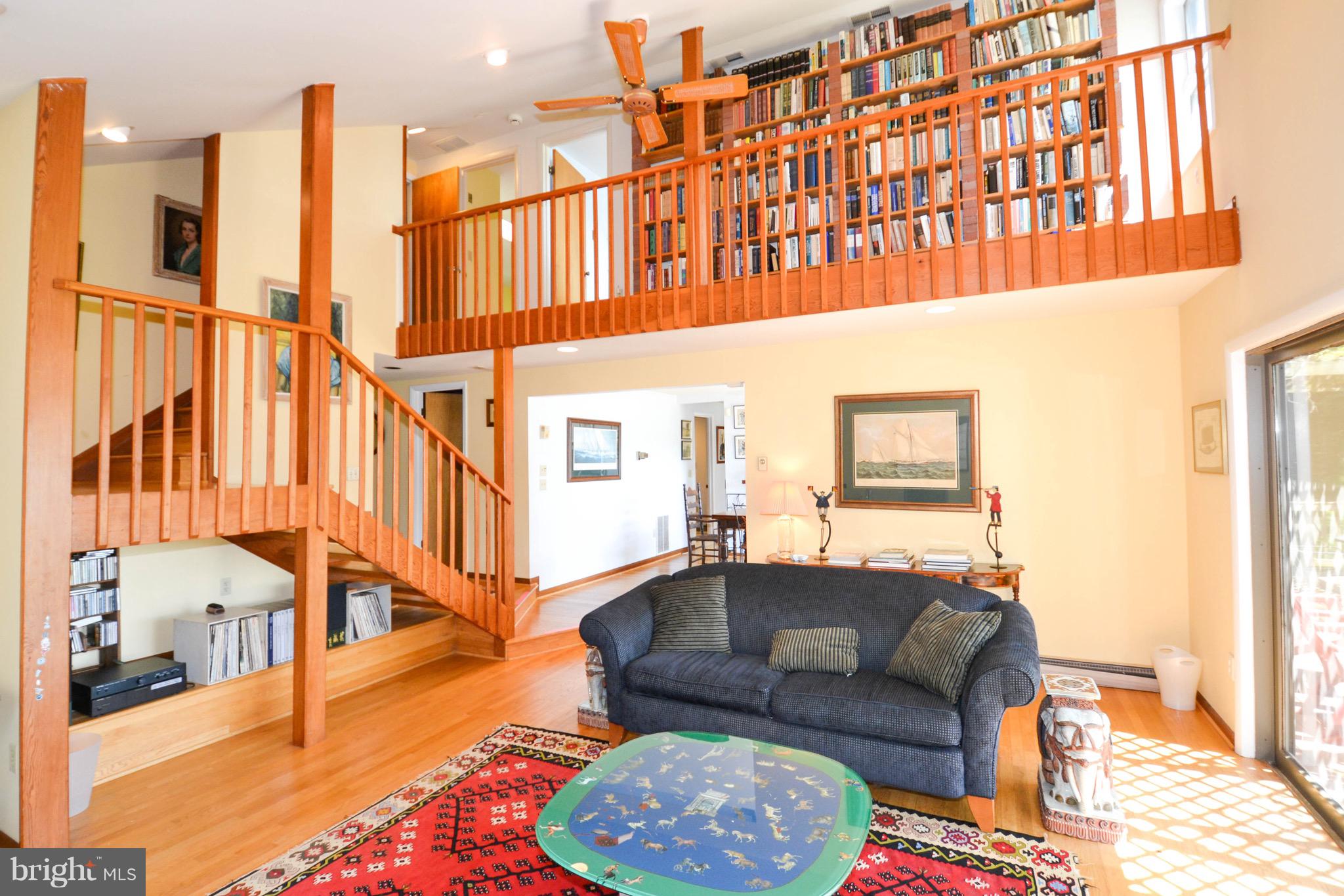 3962 Germantown Road Edgewater, MD 21037 - Photo 6 of 52 Two story waterfront living room w/ woodstove