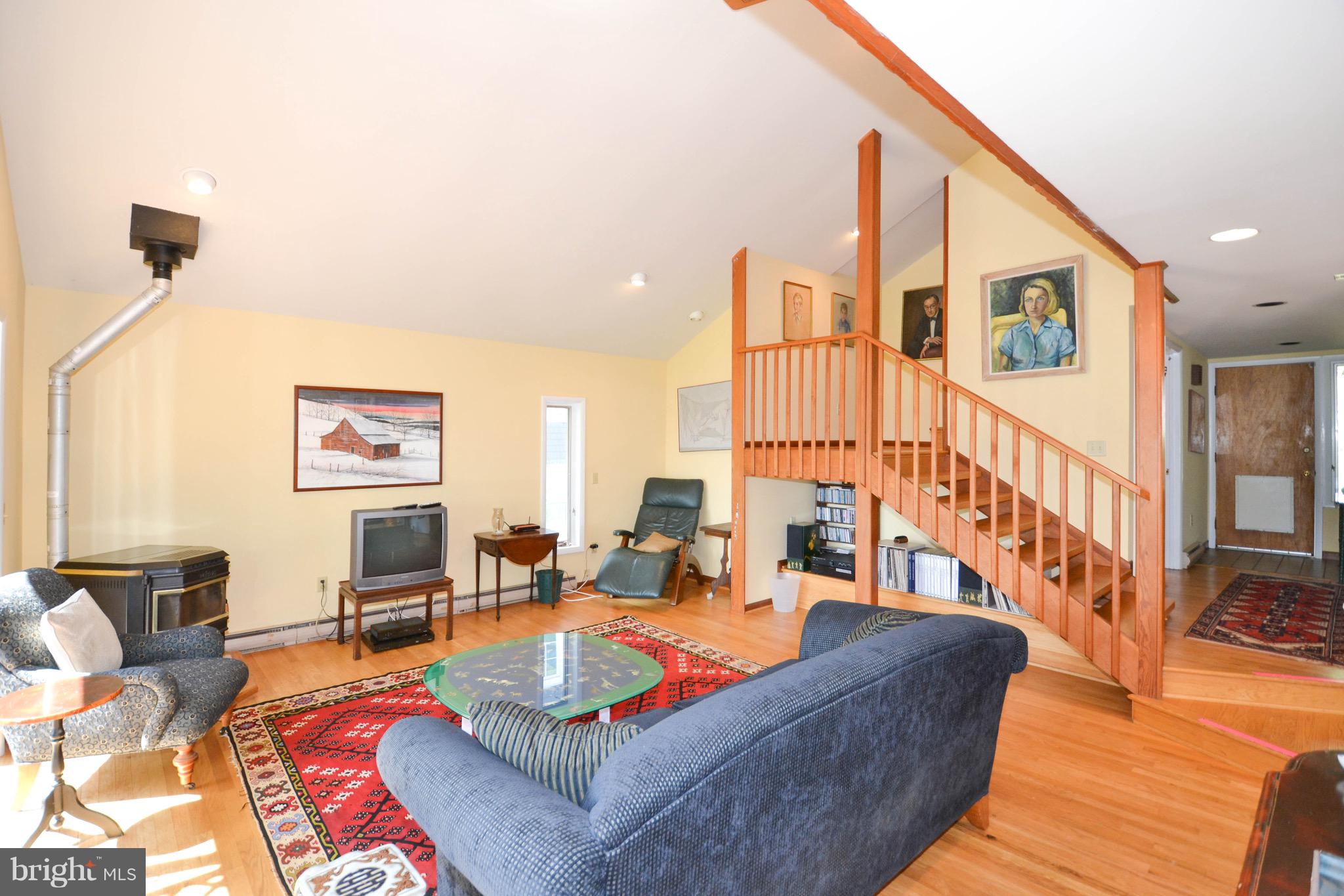 3962 Germantown Road Edgewater, MD 21037 - Photo 7 of 52 Two story waterfront living room w/ woodstove