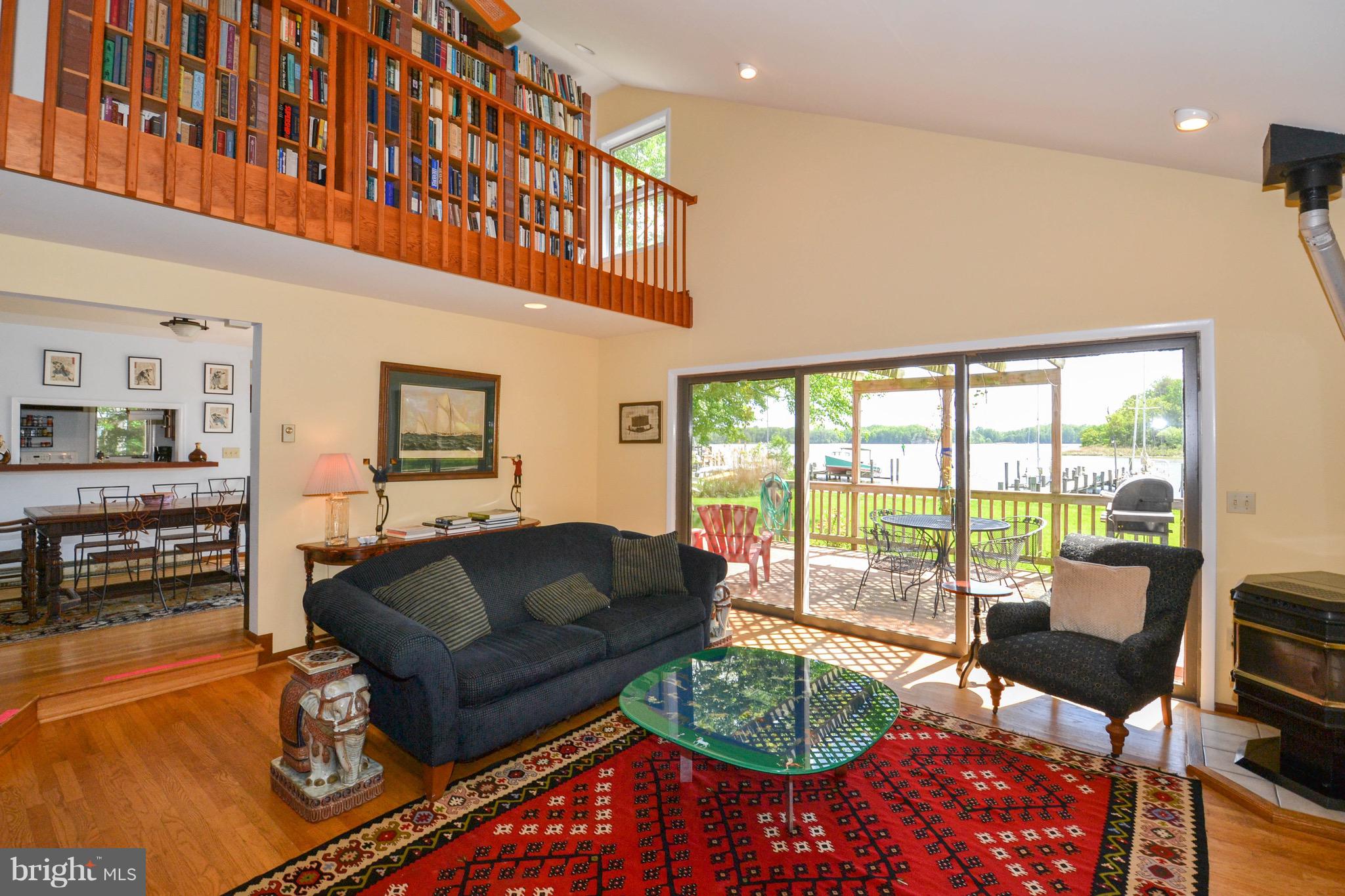 3962 Germantown Road Edgewater, MD 21037 - Photo 8 of 52 Two story waterfront living room w/ woodstove