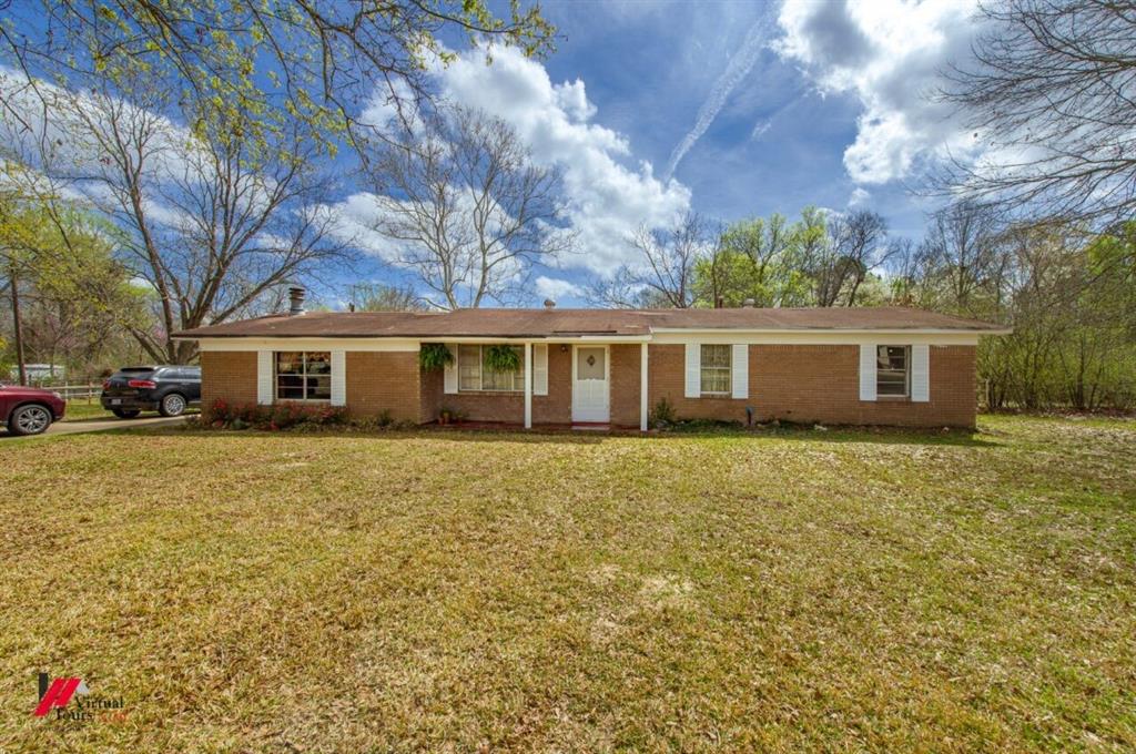 6103 Colquitt Road Keithville, LA 71047 - Photo 2 of 34 a outdoor space with garden view