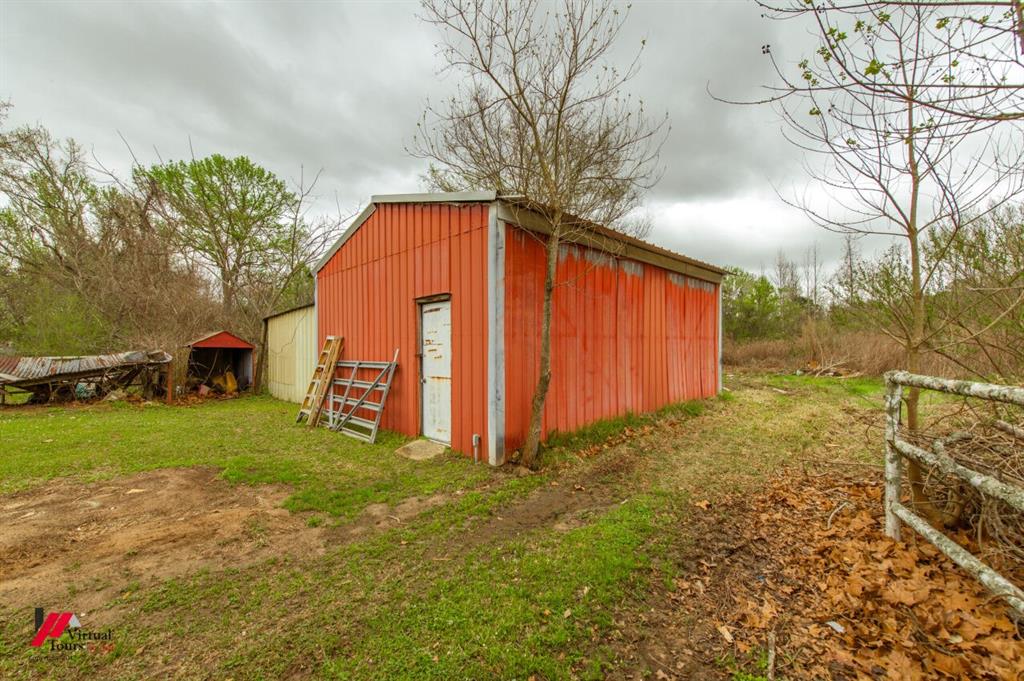 6103 Colquitt Road Keithville, LA 71047 - Photo 31 of 34 a view of a backyard