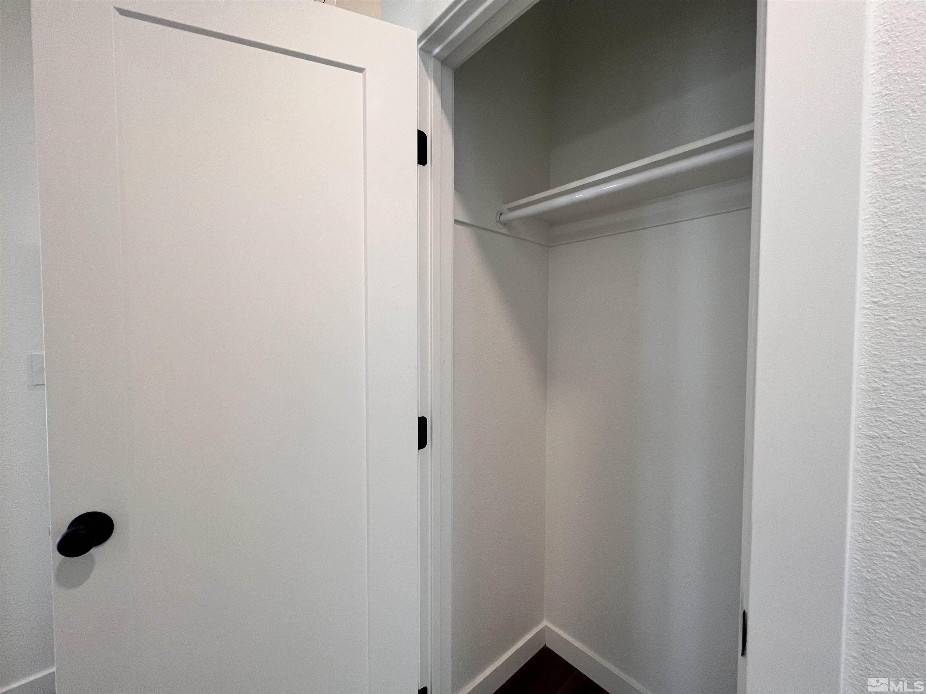 682 Silver Spur Drive Fallon, NV 89406 - Photo 11 of 29 a bathroom with a glass shower door