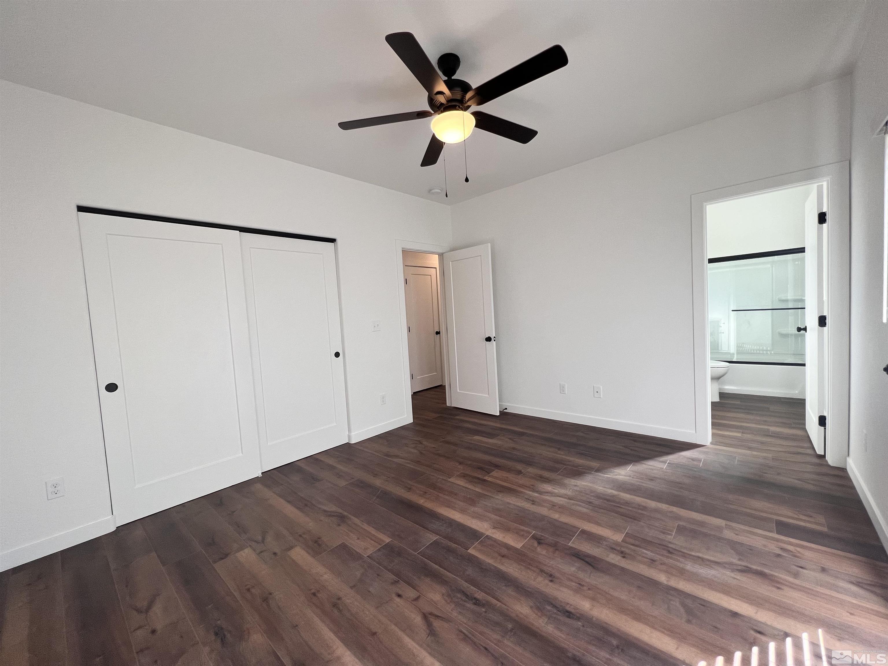 682 Silver Spur Drive Fallon, NV 89406 - Photo 13 of 29 a view of empty room with wooden floor