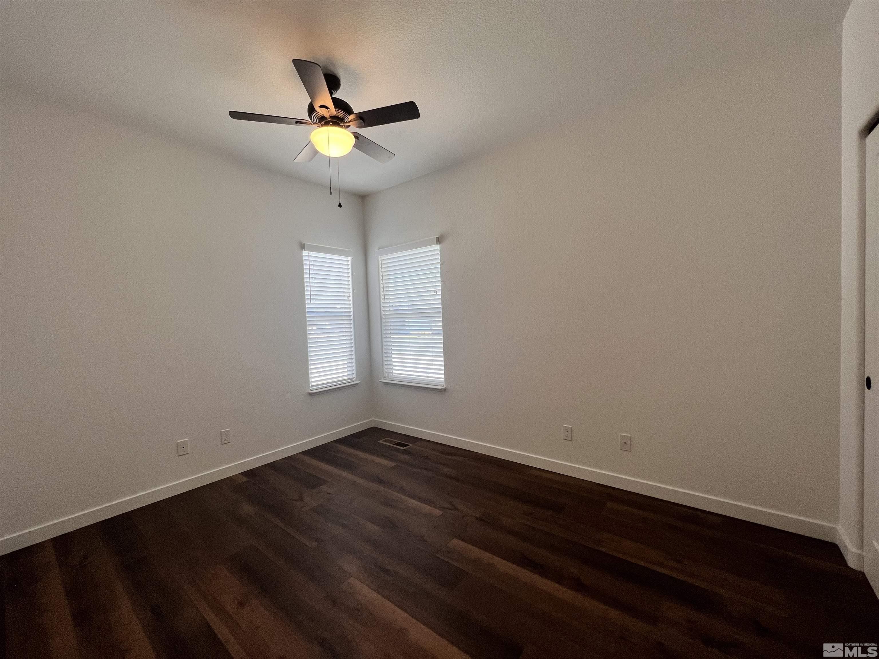 682 Silver Spur Drive Fallon, NV 89406 - Photo 20 of 29 a view of room with window and ceiling fan