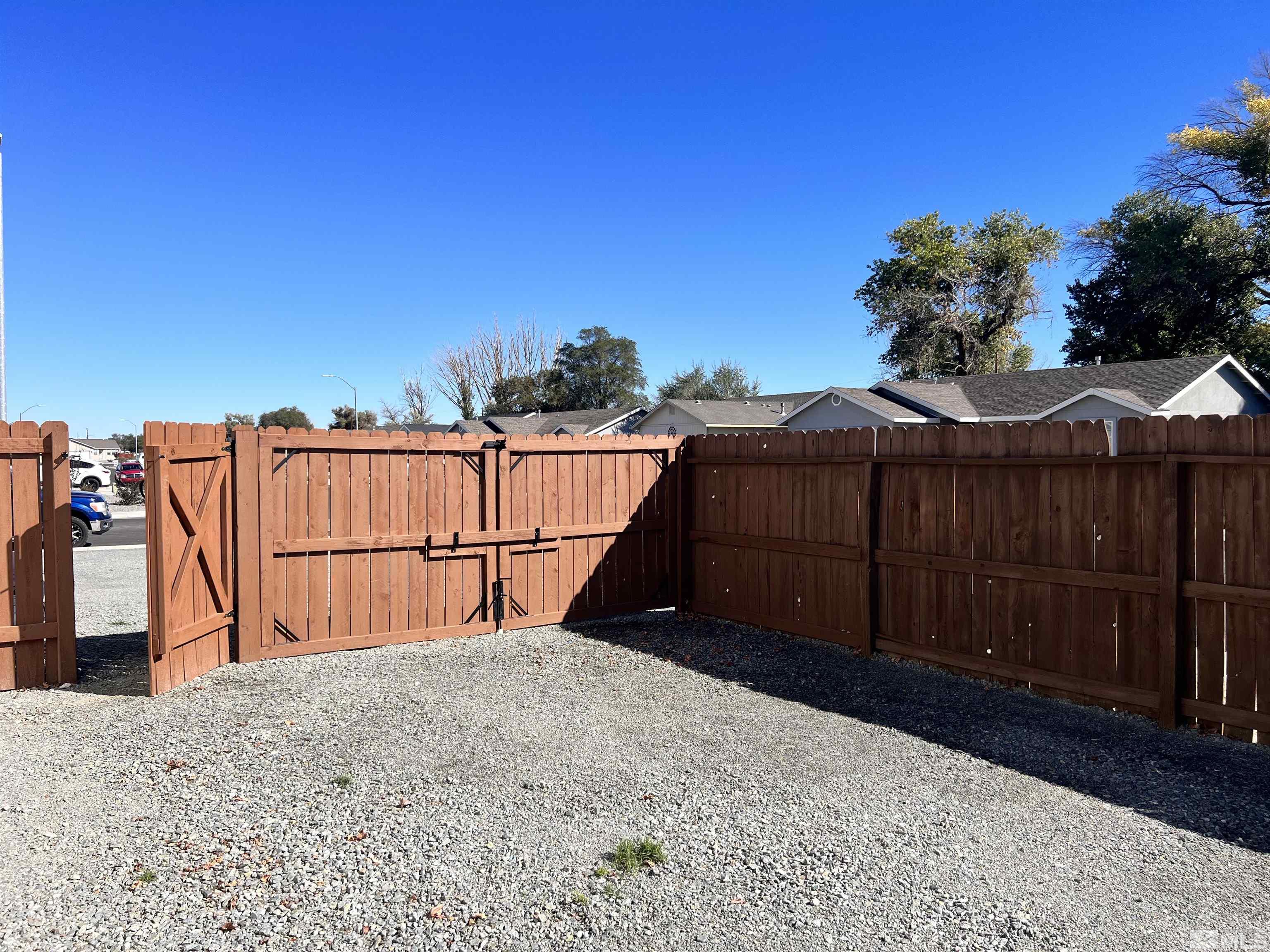682 Silver Spur Drive Fallon, NV 89406 - Photo 27 of 29 a backyard of a house with lots of green space