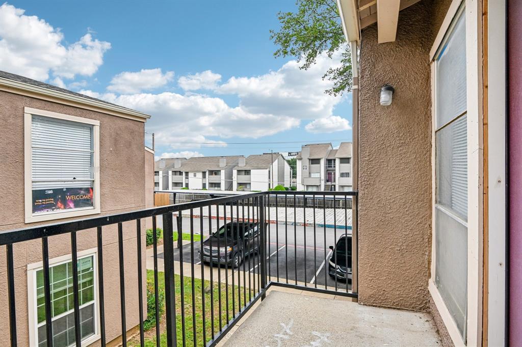5534 Boca Raton Boulevard, Unit 292 Fort Worth, TX 76112 - Photo 17 of 31 a view of a balcony with a potted plant