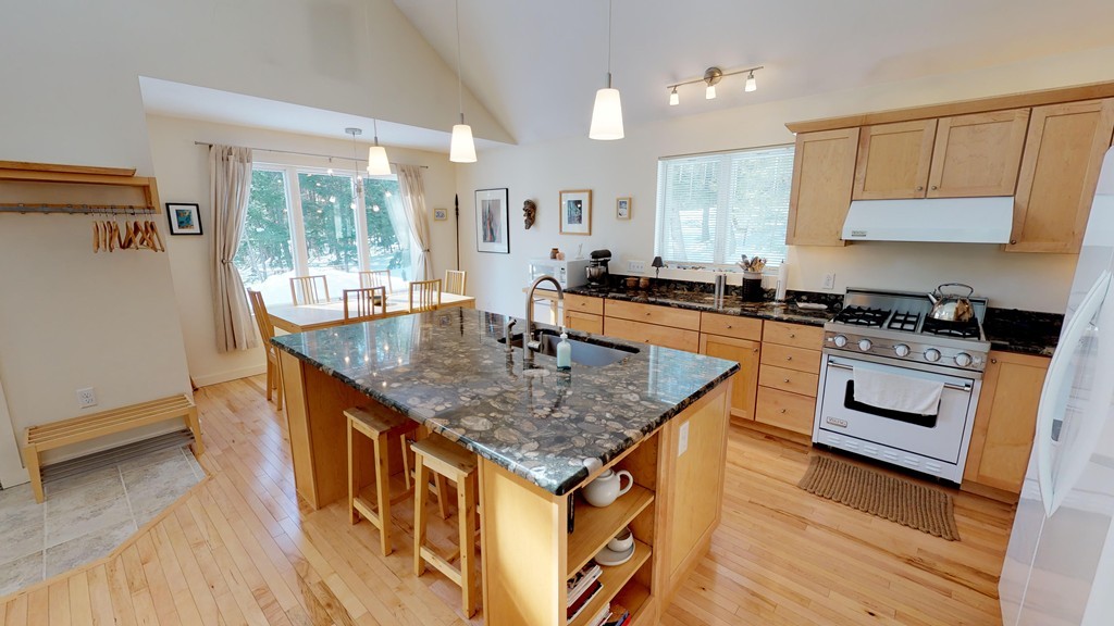 80 Rindge Turnpike Ashburnham, MA 01430 - Photo 11 of 30 a kitchen with stainless steel appliances granite countertop a stove a sink and a refrigerator