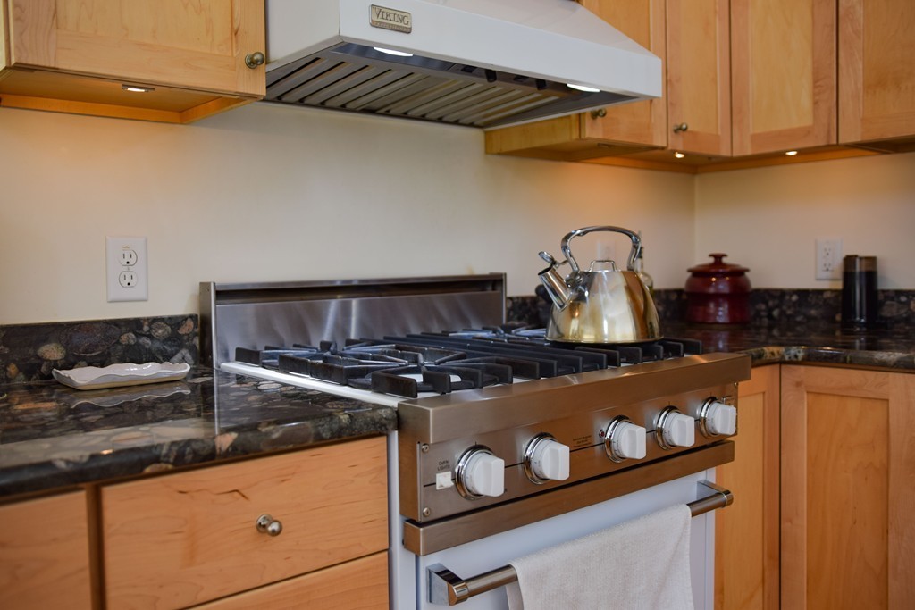 80 Rindge Turnpike Ashburnham, MA 01430 - Photo 20 of 30 a kitchen with a stove and a cabinets