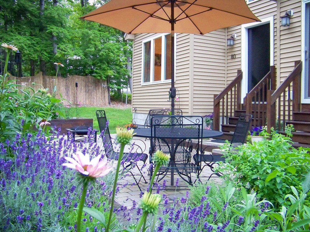 80 Rindge Turnpike Ashburnham, MA 01430 - Photo 2 of 30 a view of a chairs and table in the backyard