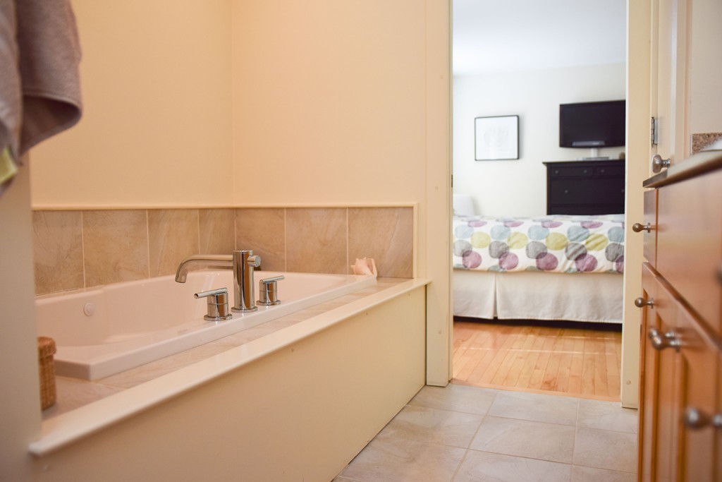 80 Rindge Turnpike Ashburnham, MA 01430 - Photo 28 of 30 a bathroom with a sink and a bathtub