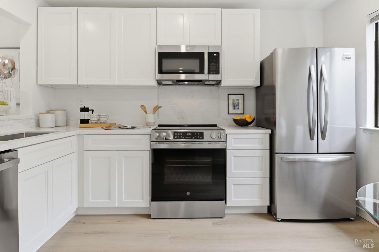 318 Sylvia Way San Rafael, CA 94903 - Photo 12 of 39 A well-appointed kitchen showcases all-new stainless steel appliances...