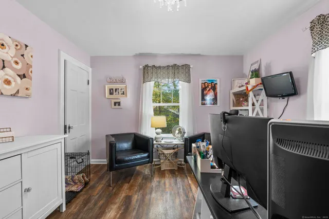 a bathroom with a sink a shower and a mirror