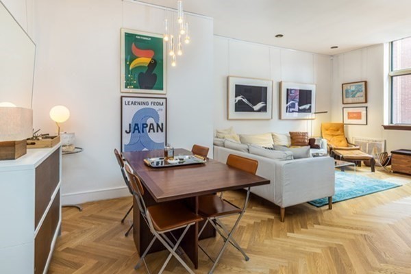 2 Clarendon Street, Unit 203 Boston, MA 02116 - Photo 3 of 7 a living room with furniture and wooden floor