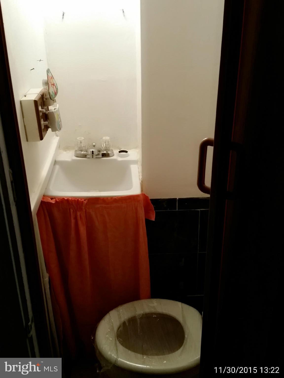 1330 East Cold Spring Lane Baltimore, MD 21239 - Photo 19 of 19 1st Floor Half Bath