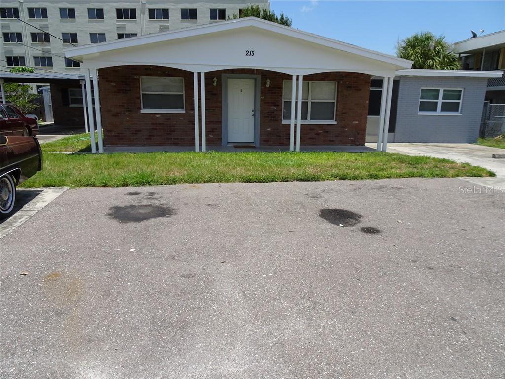 Freshly painted, Front of the building. 8+ Parking spaces plus a carport