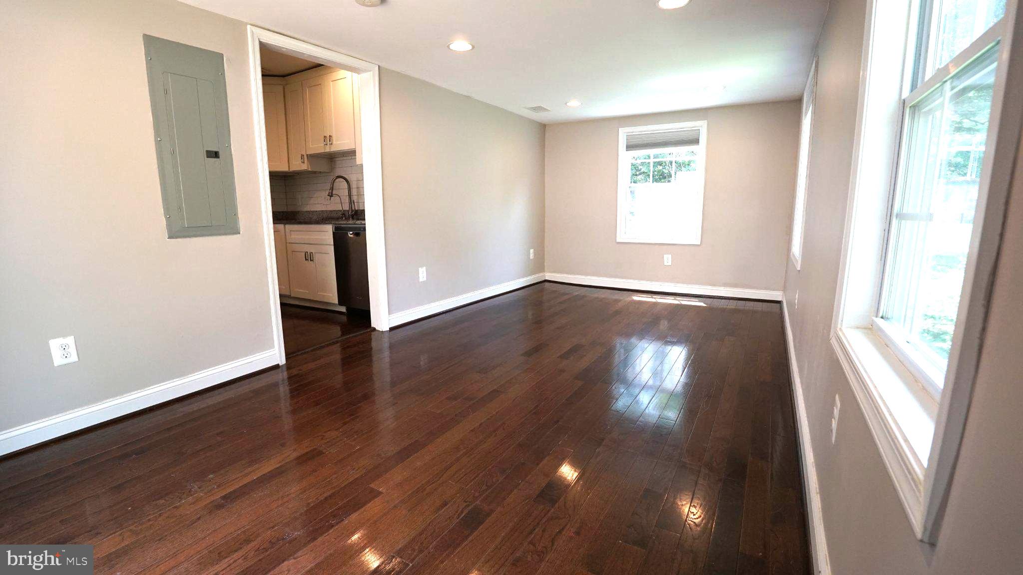2006 Griffith Road Falls Church, VA 22043 - Photo 5 of 17 an empty room with wooden floor and windows