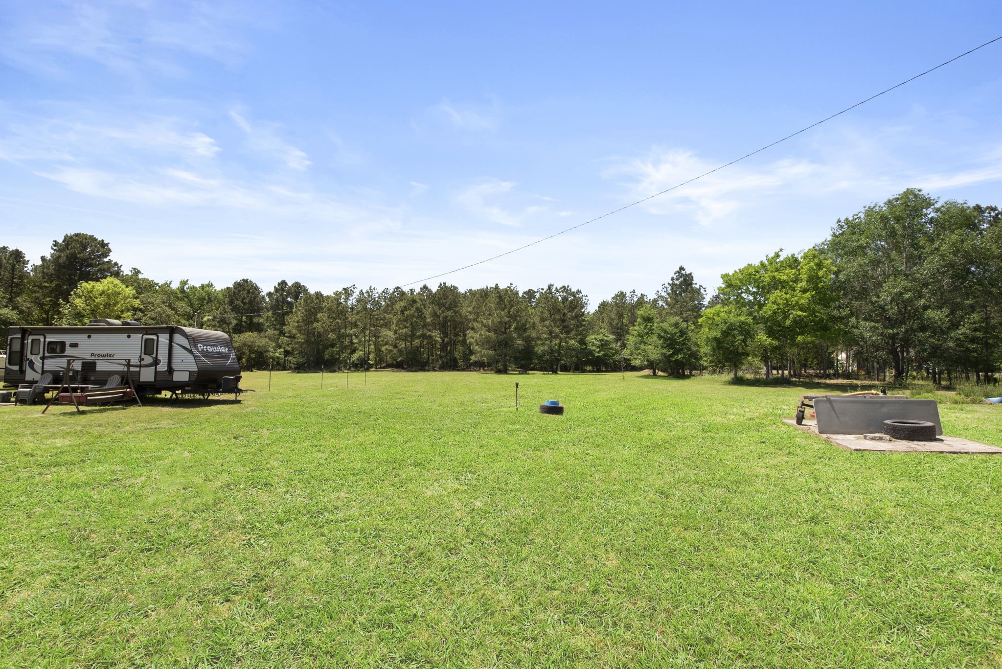 2814 Farm To Market Road 356 Trinity, TX 75862 - Photo 11 of 39 a view of a garden and basketball court