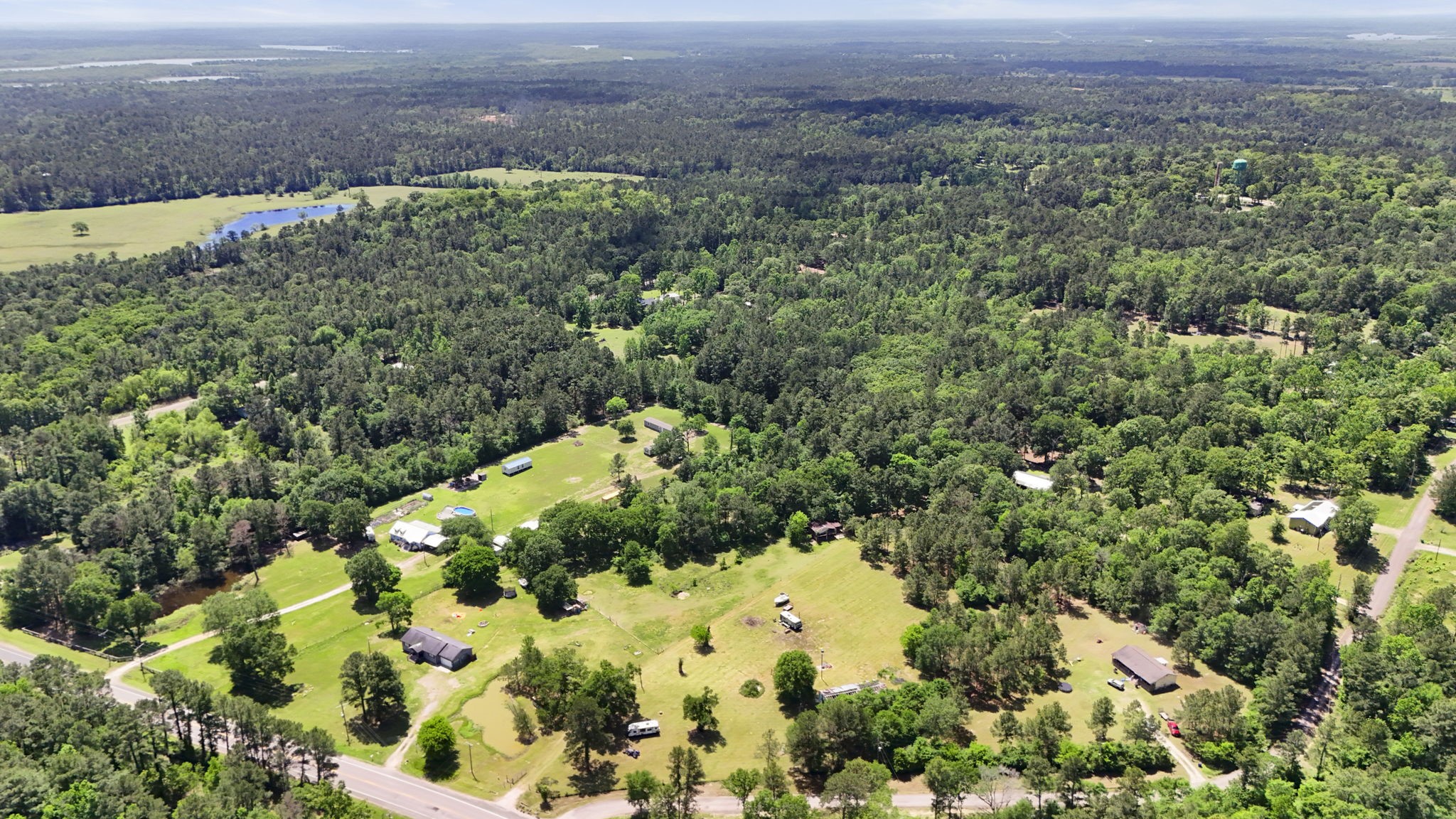 2814 Farm To Market Road 356 Trinity, TX 75862 - Photo 27 of 39 a view of a garden with a building