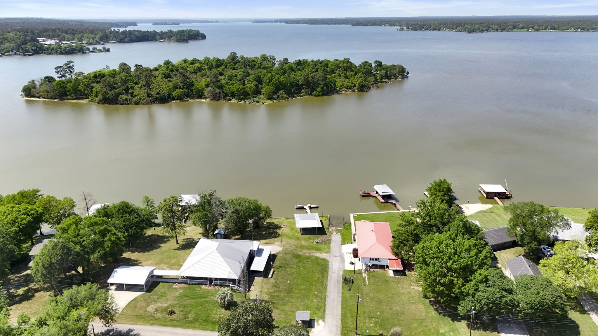 2814 Farm To Market Road 356 Trinity, TX 75862 - Photo 35 of 39 an aerial view of house with yard and lake view