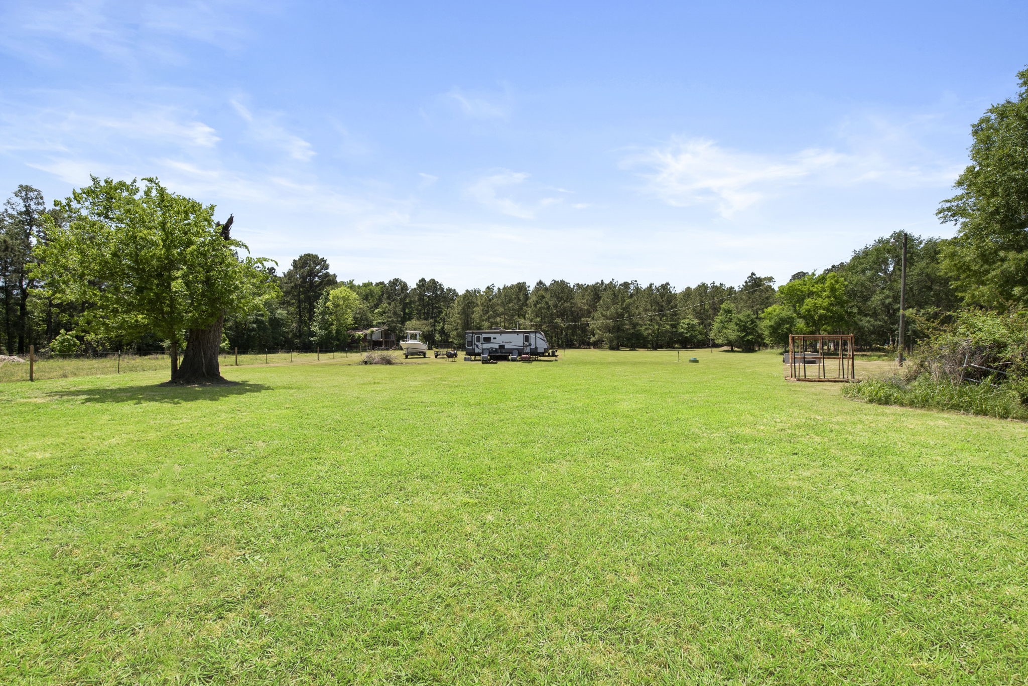 2814 Farm To Market Road 356 Trinity, TX 75862 - Photo 8 of 39 a view of green field with trees in the background