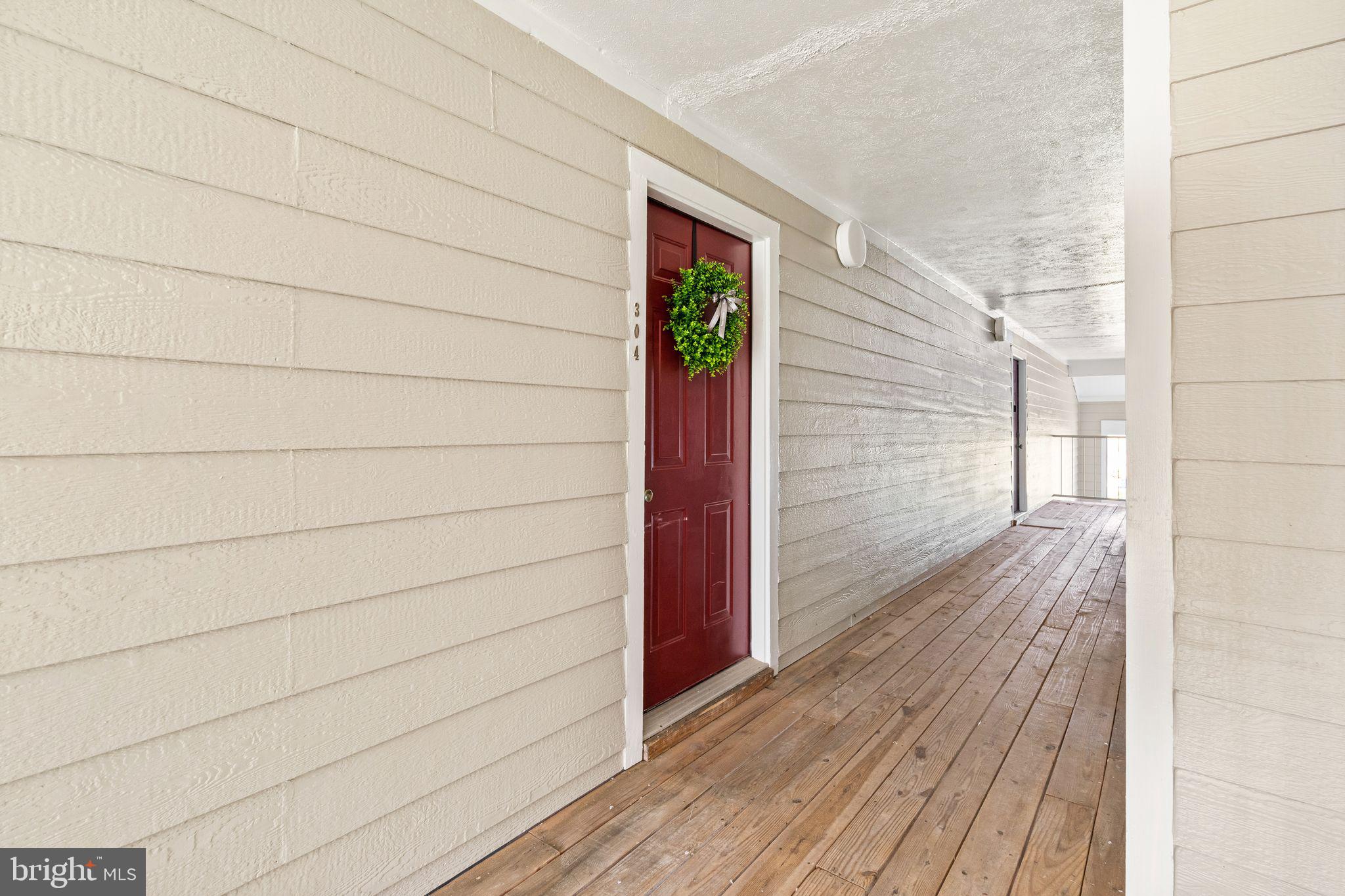 20951 Timber Ridge Terrace, Unit 304 Ashburn, VA 20147 - Photo 1 of 38 Front Door/ Entry hallway