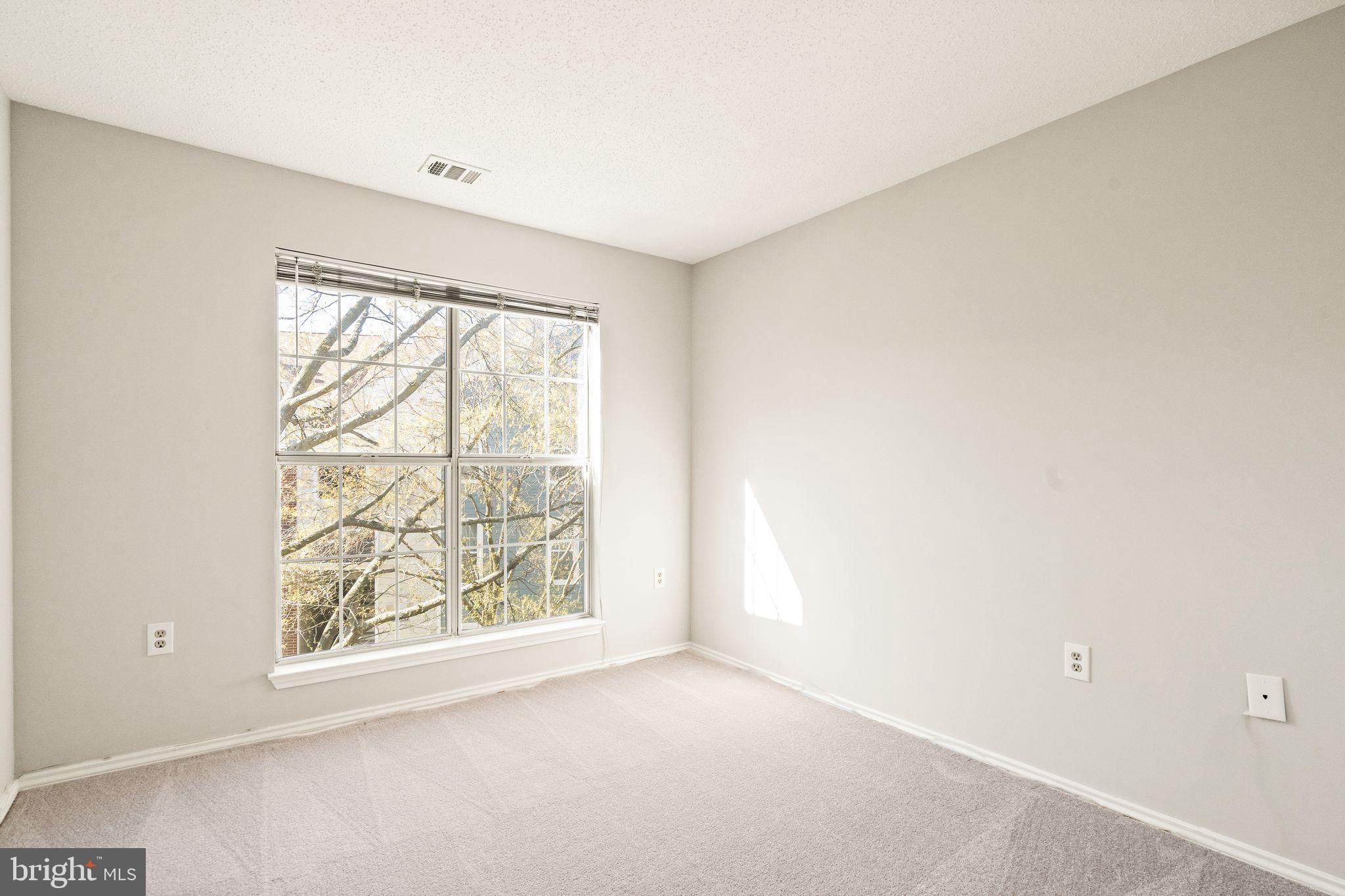20951 Timber Ridge Terrace, Unit 304 Ashburn, VA 20147 - Photo 18 of 38 Bedroom 1