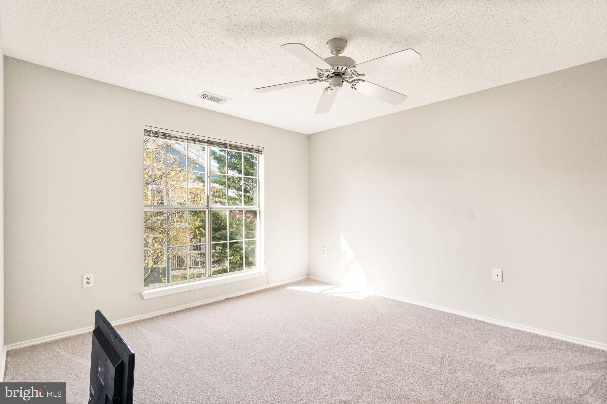 20951 Timber Ridge Terrace, Unit 304 Ashburn, VA 20147 - Photo 22 of 38 Bedroom 2