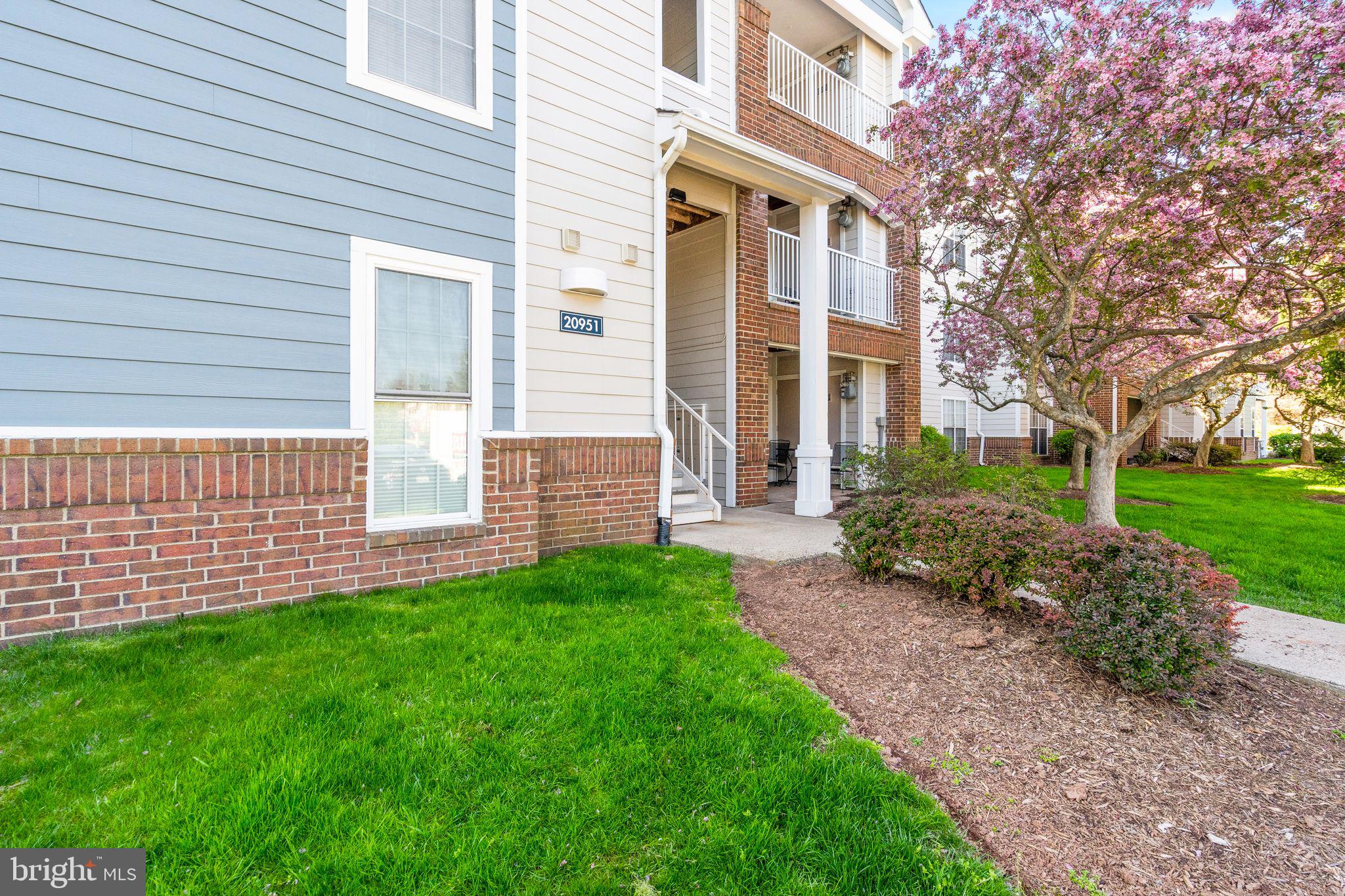 20951 Timber Ridge Terrace, Unit 304 Ashburn, VA 20147 - Photo 32 of 38 Front of building