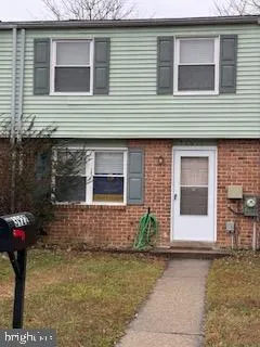 a front view of a house with a garage