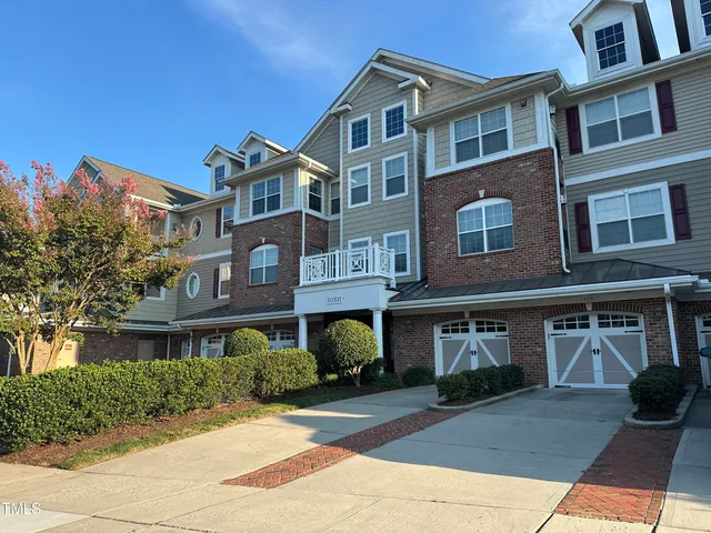 a front view of a multi story residential apartment building