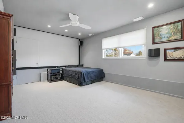 a room with furniture and a large window