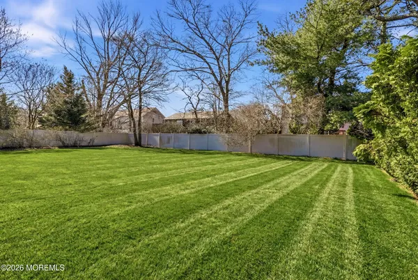 a view of a house with a big yard