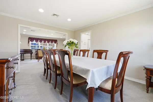 a view of a dining room with furniture
