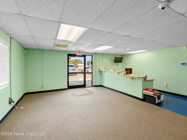 a view of room with furniture and toys