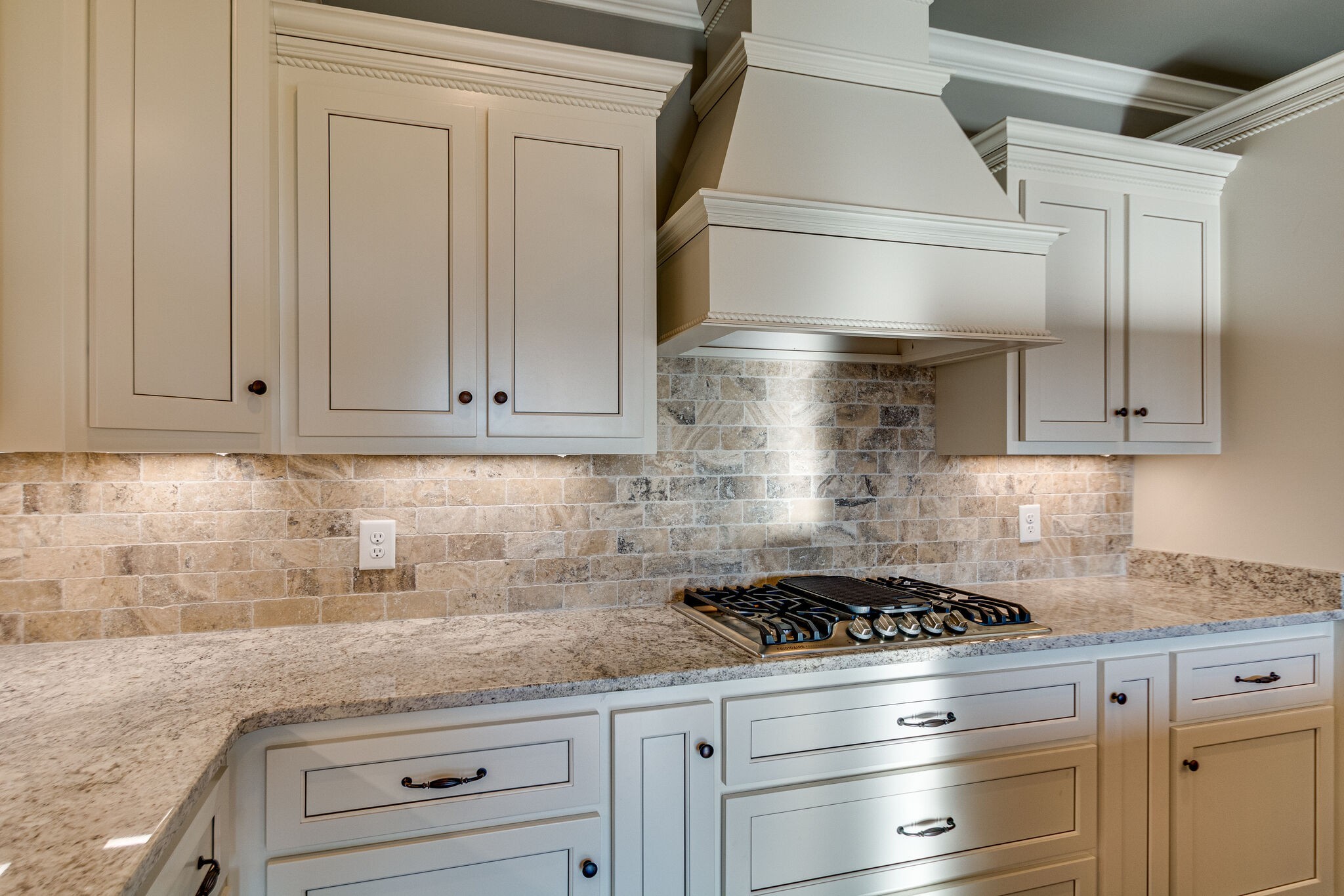 1016 Abbey Rd Way Spring Hill, TN 37174 - Photo 13 of 44 a kitchen with granite countertop white cabinets white stainless steel appliances and sink