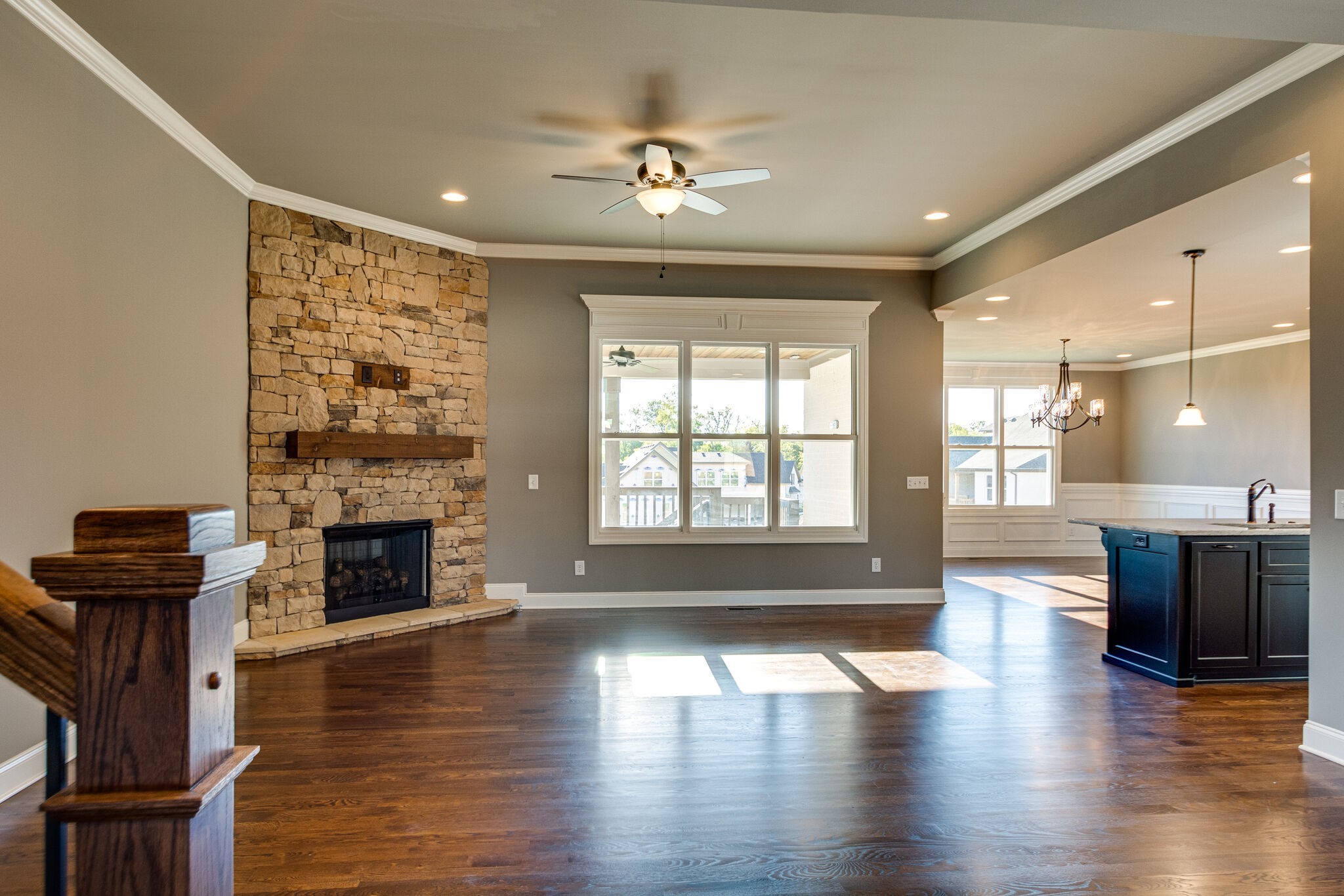 1016 Abbey Rd Way Spring Hill, TN 37174 - Photo 3 of 44 a view of an empty room with wooden floor and a fireplace