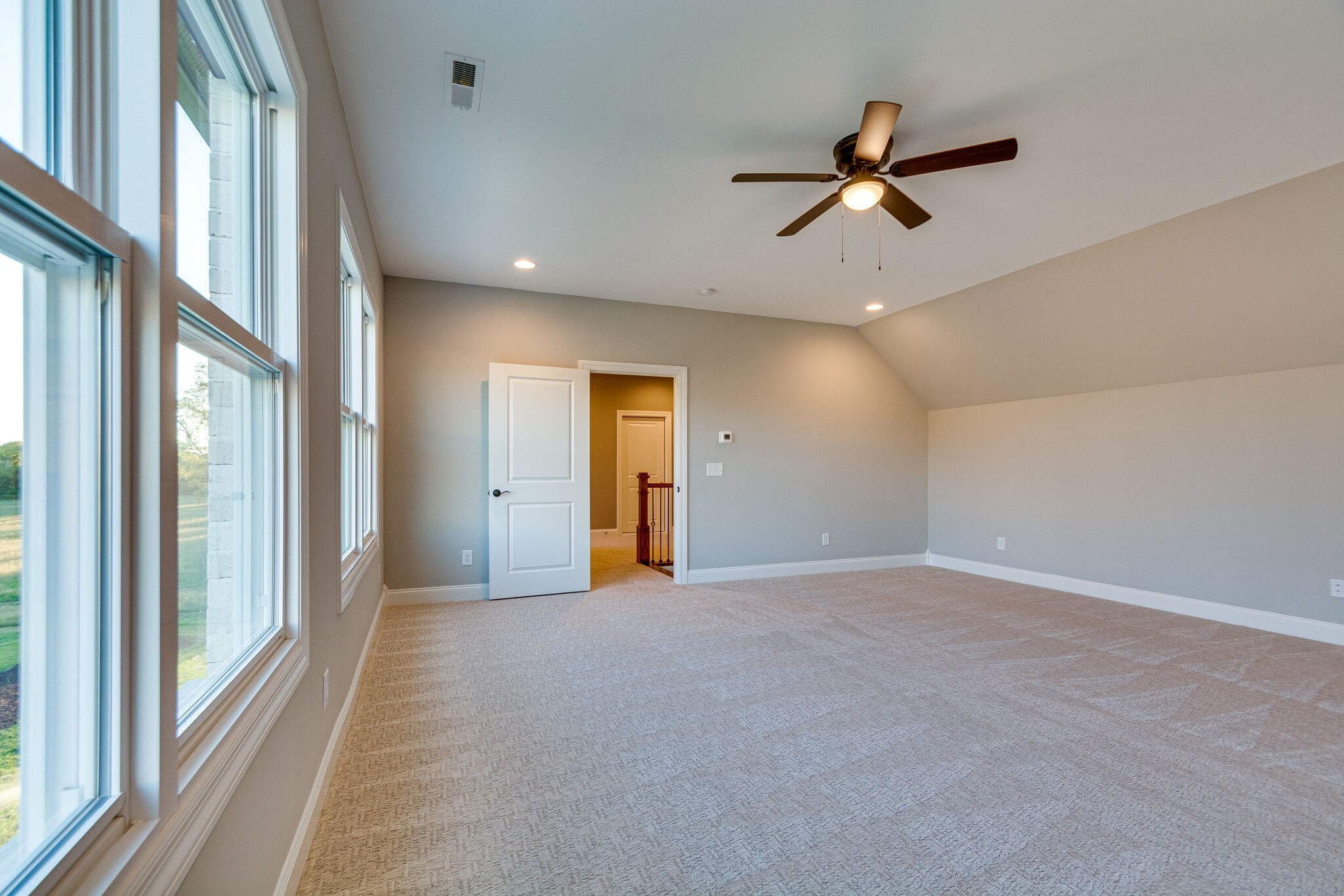 1016 Abbey Rd Way Spring Hill, TN 37174 - Photo 33 of 44 a view of empty room with wooden floor and fan
