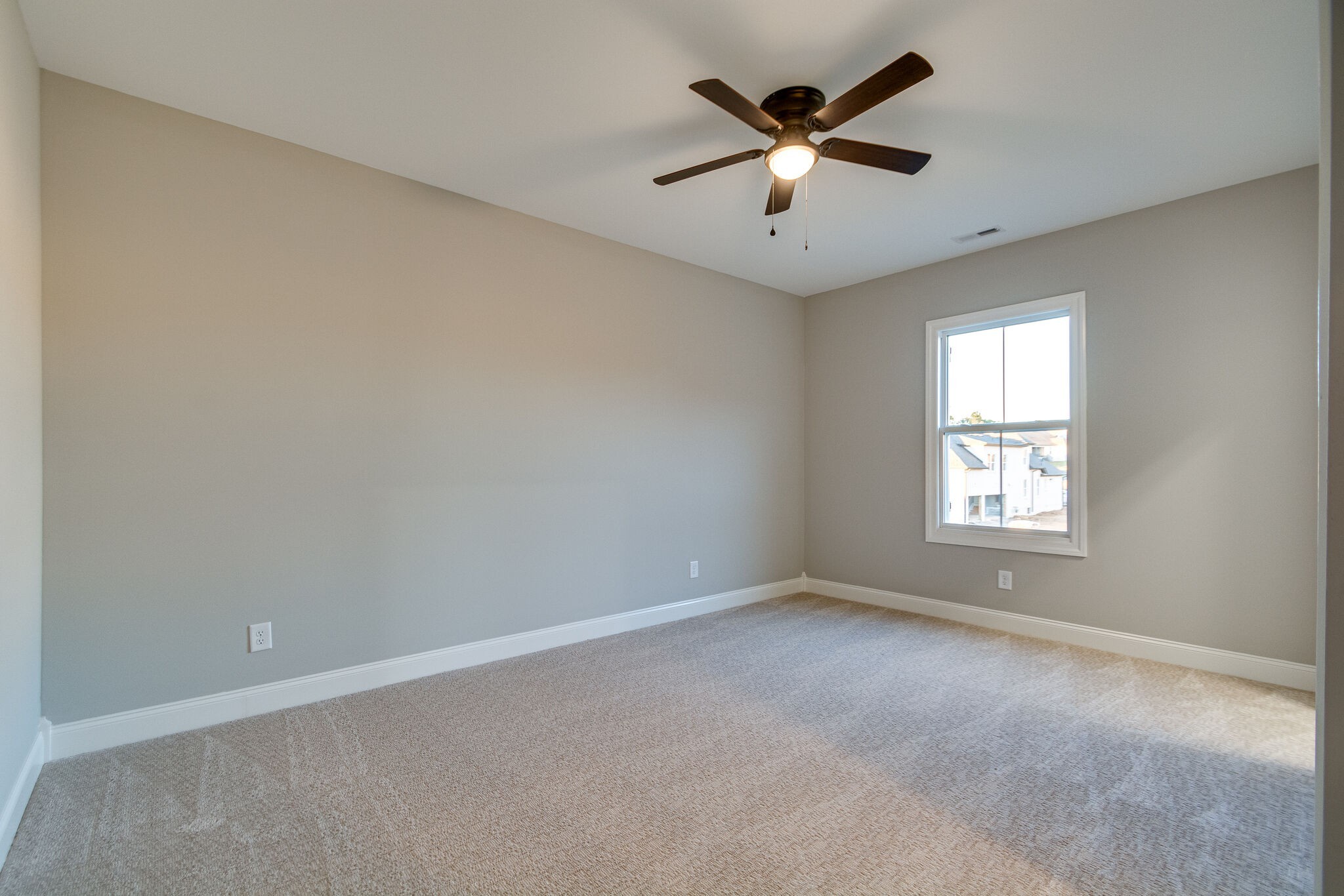 1016 Abbey Rd Way Spring Hill, TN 37174 - Photo 37 of 44 an empty room with a window and a fan